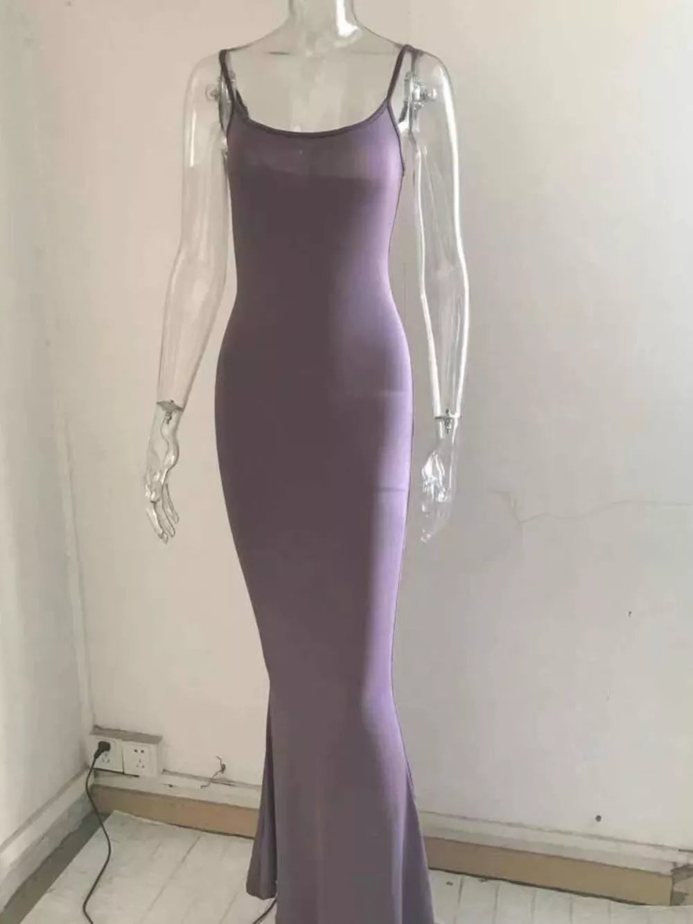 Mauve spaghetti strap bodycon maxi dress with a fishtail hem.