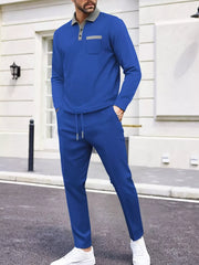 Men's royal blue waffle knit two-piece lounge set with polo collar shirt and drawstring pants.