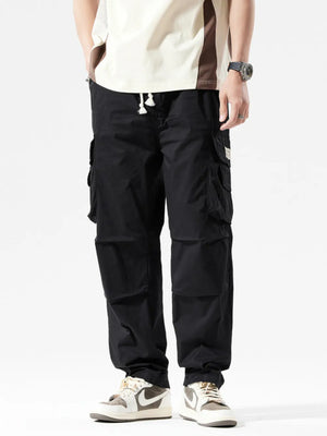 Black cargo pants for men with multiple pockets and drawstring waist.