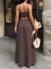 Brown striped maxi dress with smocked bodice and cutout back detail.