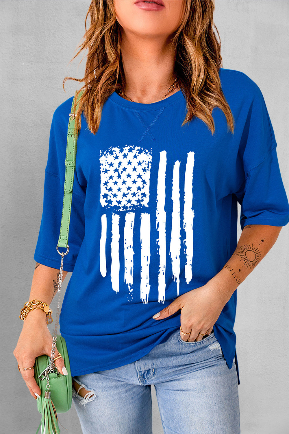 Cobalt blue distressed flag tee with crew neck and 3/4 sleeves.