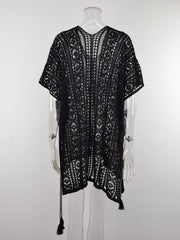 Black open-knit V-neck beach cover-up with short sleeves and tassel details.