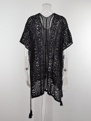 Black open-knit V-neck beach cover-up with short sleeves and tassel details.