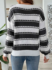 Textured stripe crewneck sweater in black and white with a relaxed fit.