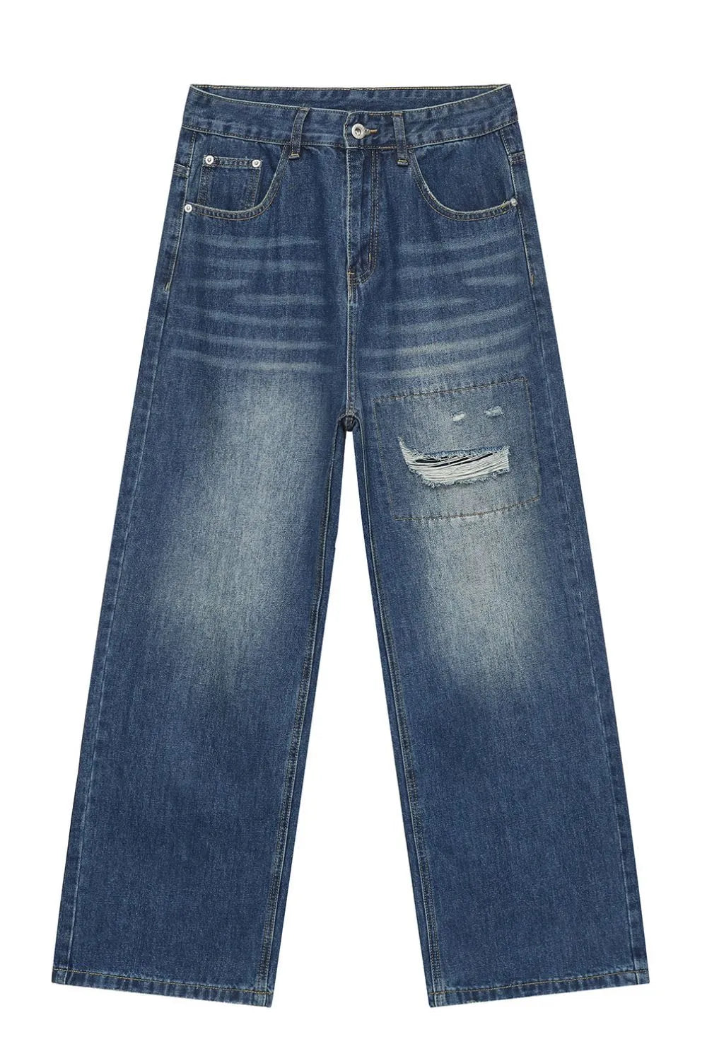 Baggy denim jeans in medium wash with patchwork and distressed details.