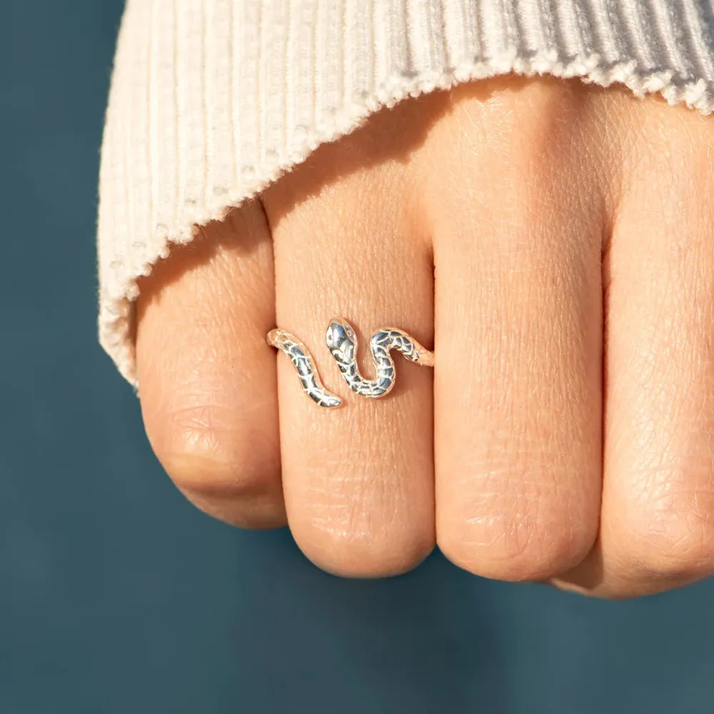 Silver snake ring with intricate detailing, made of 925 sterling silver.