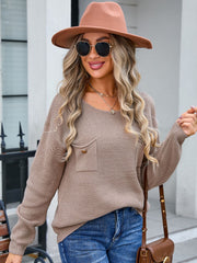 Khaki textured knit sweater with V-neck and button pocket detail.