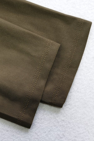 Sporty legging swimsuit detail in black with visible stitching and ribbed texture.