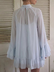 Sheer Mock Neck Flare Sleeve Dress in Sky Blue, model styling view