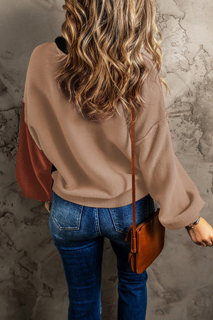 Cozy knit sweater with balloon sleeves in tan and rust colorblock, crew neck, casual style.