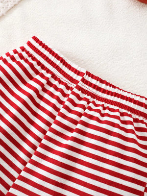Red and white striped baby pajama bottoms with elastic waistband.