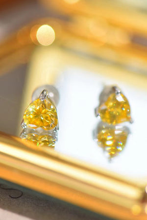 Radiant Heart Moissanite Studs in yellow, featuring sparkling triangular-cut stones.