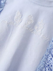 Light blue cotton t-shirt with embroidered floral detail and ruffled eyelet trim.