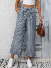 Navy blue and white striped wide leg pants with drawstring and pockets