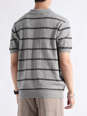 Men's gray knit polo with black stripes, short sleeves, and a textured finish.