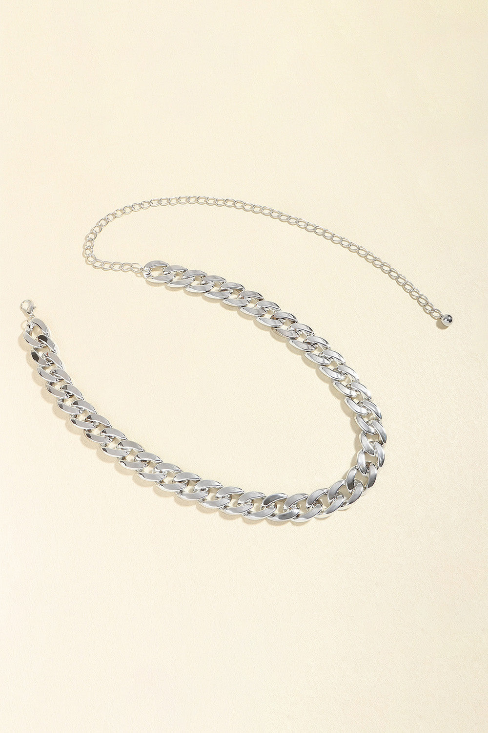 Silver chunky curb chain belt with a delicate extender chain.
