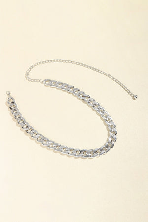 Silver chunky curb chain belt with a delicate extender chain.
