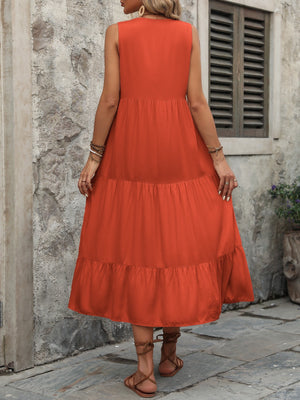 Orange-Red tiered midi sundress with button detail, sleeveless, V-neck, casual boho style.