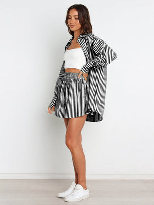 Oversized black and white stripe shirting set with a button-up shirt and drawstring shorts.