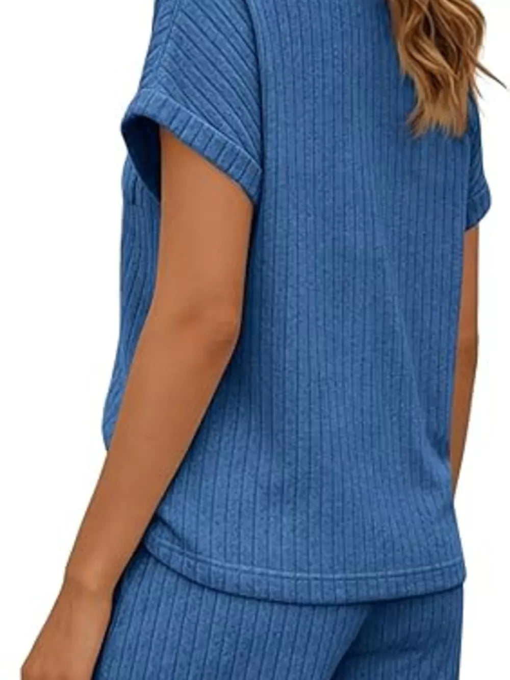 Blue ribbed knit loungewear set with short sleeves and cuffed hems.