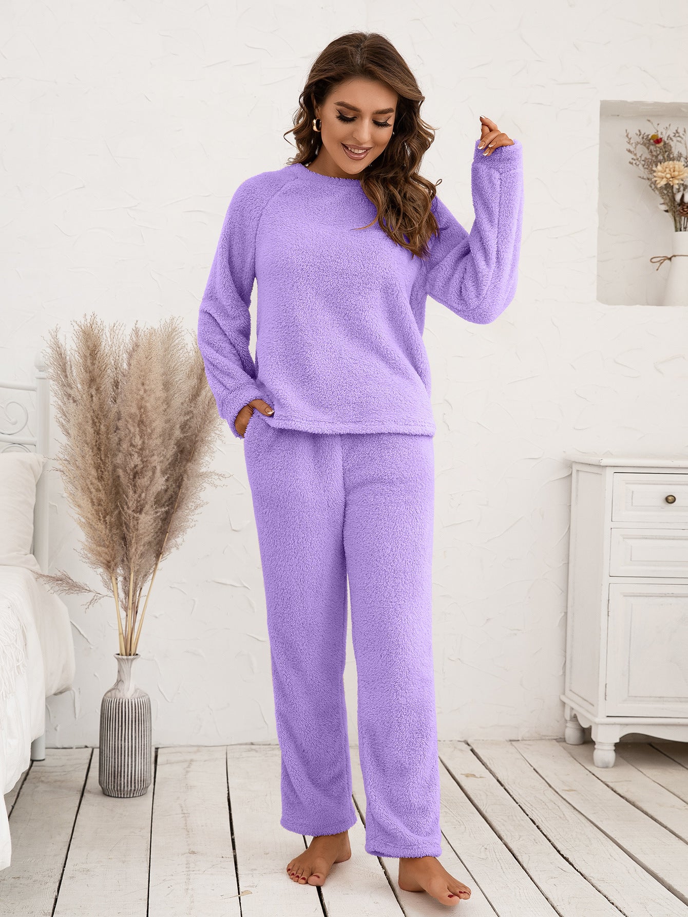 Plush loungewear set in lavender with raglan sleeves and straight-leg pants.