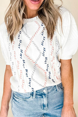 White cable knit puff sleeve top with diamond pattern detail