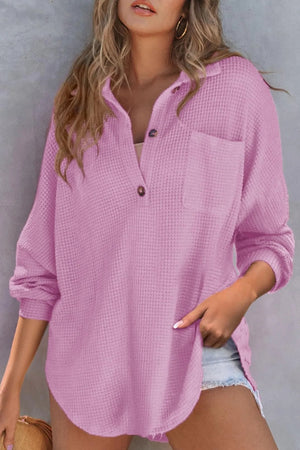 Lilac waffle knit henley shirt with button placket and chest pocket.