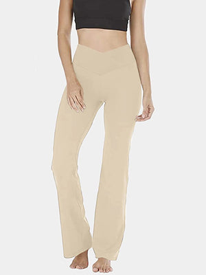 Sand V-waist flare leg leggings with a high rise and bootcut hem.