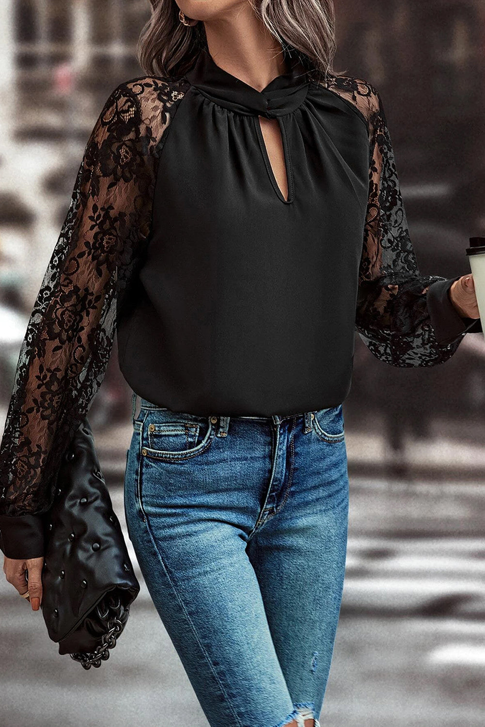 Black lace sleeve blouse with keyhole neckline and gathered detail.