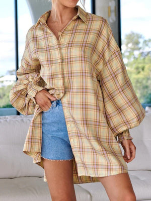 Oversized plaid shirt with balloon sleeves in yellow, pink, and brown plaid.