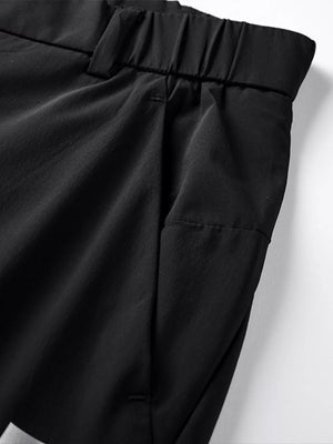 Men's black relaxed fit sweatpants with elastic waistband and side pockets.