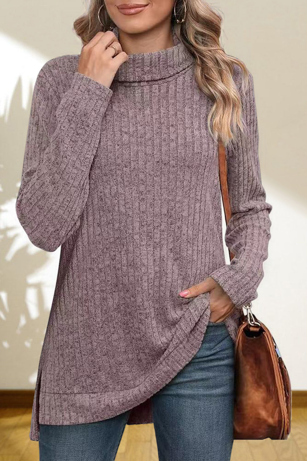 Ribbed knit turtleneck tunic top in lavender with long sleeves and side slits.
