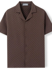 Textured quilted camp collar shirt in coffee brown with all-over geometric pattern.