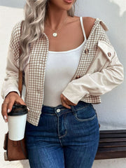 Beige corduroy jacket with houndstooth panels, button front and chest pockets.
