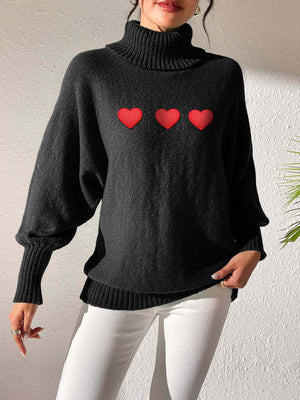 Black turtleneck sweater with balloon sleeves and three red heart appliqués