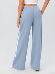 Pastel blue palazzo trousers with white side stripe detail and wide leg.