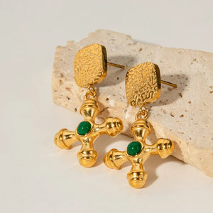 Textured gold-plated cross drop earrings with green stone detail