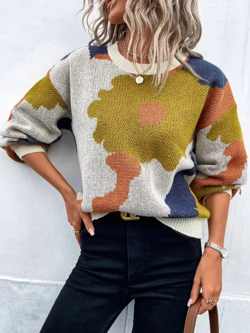 Abstract floral knit sweater with round neck in multicolor, featuring a casual fit and long sleeves.