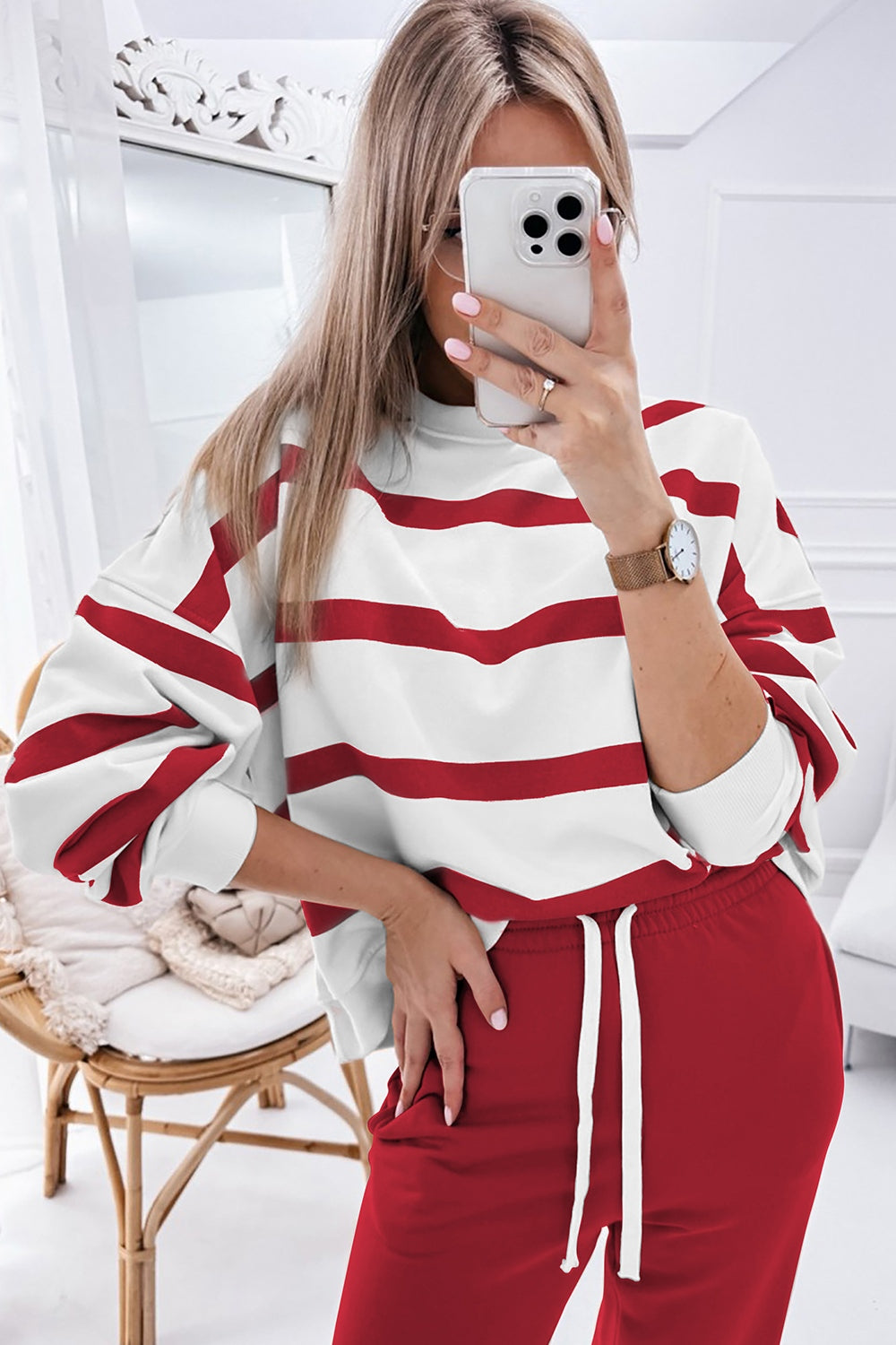 Bold Stripe Lounge Set: white sweatshirt with red stripes, red drawstring pants.