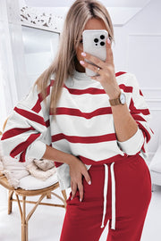 Bold Stripe Lounge Set: white sweatshirt with red stripes, red drawstring pants.