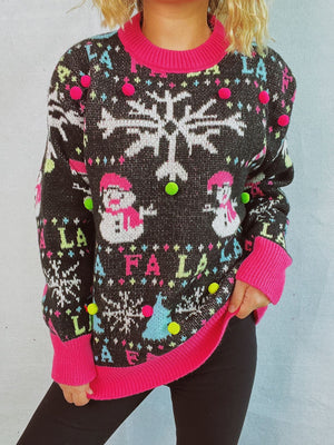 Black knit sweater with snowmen, snowflakes, and pom-pom details.
