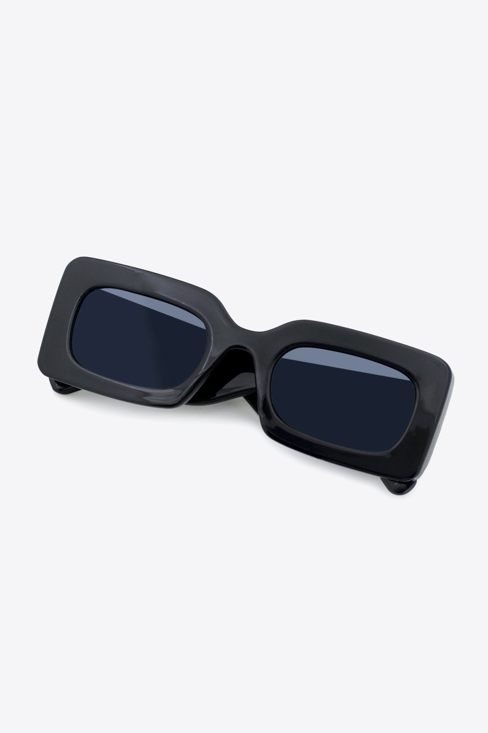 Black acetate rectangle sunglasses with dark lenses.