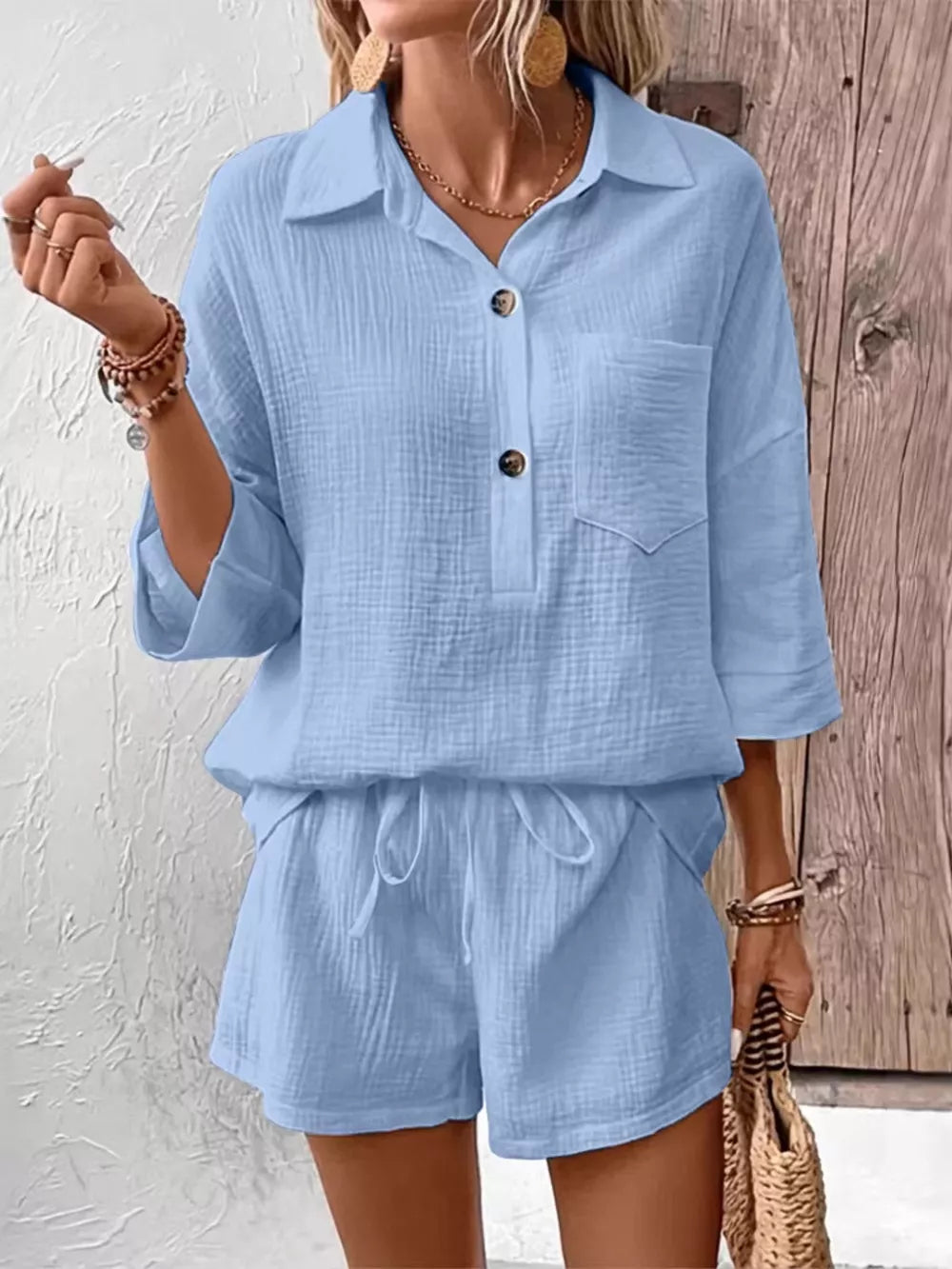 Sky blue cotton two-piece set with button-up shirt and drawstring shorts
