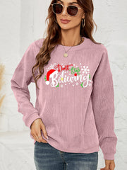Dusty Pink corduroy crewneck sweatshirt with "Don't Stop Believing" Christmas graphic and snowflakes.