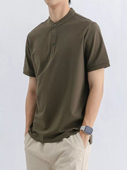 Men's dark green cotton t-shirt with mandarin collar and button placket.