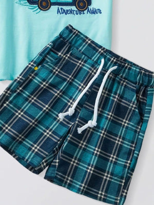 Toddler graphic tee with "Adventure Awaits" text and blue plaid shorts with drawstring.