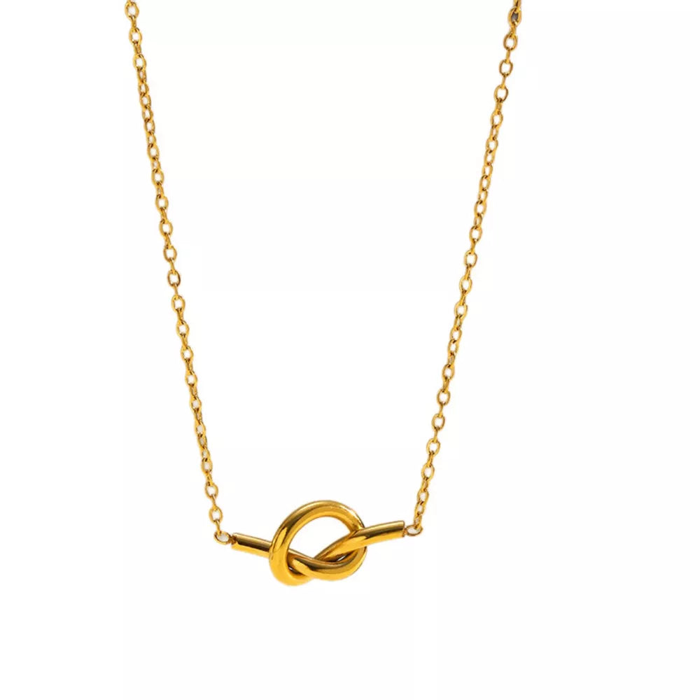 Gold-plated knot pendant necklace with delicate chain.