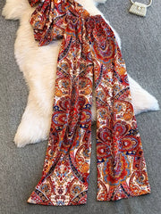 Chic paisley print cami and wide-leg pant set in rust and indigo.