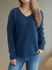 Relaxed-fit V-neck knit sweater in Peacock Blue with ribbed hem and cuffs.