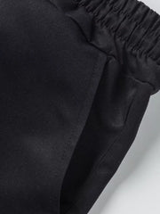 Black cargo shorts with elastic waistband and pocket detail